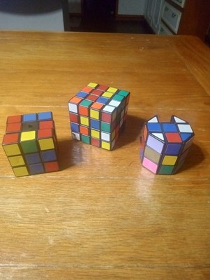 Lot Rubix Cubes , 4/4,3/3, And Prism Barrel 