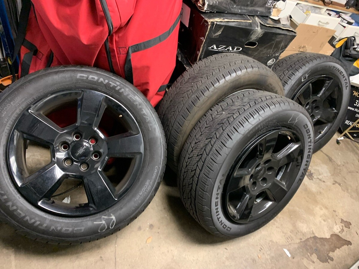 2018 Chevy Silverado 1500 Set Of OEM gloss black rims, tires, lugs wheel  locks