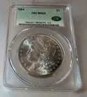 Has Toning 1884 MORGAN SILVER DOLLAR CAC MS62