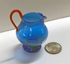 Miniature Blue Plastic Pitcher