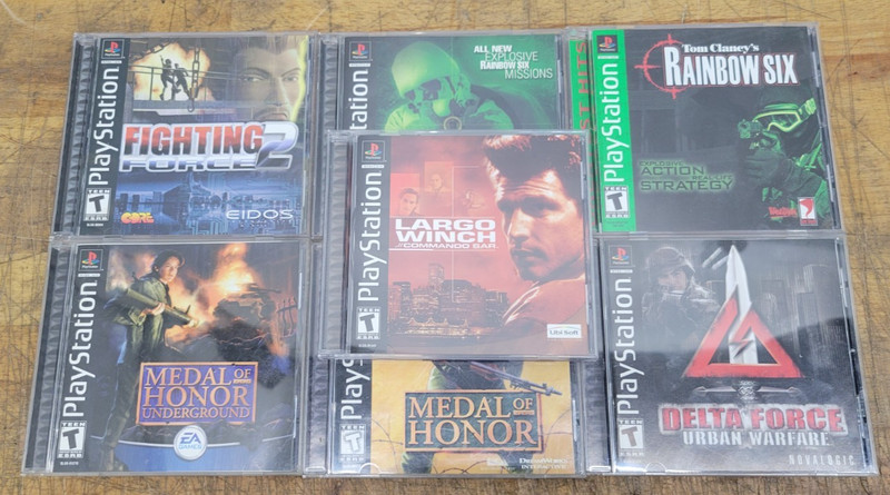 Lot of 7 PS1 Action Games: Rainbow Six, Medal of Honor, Largo Winch - USED