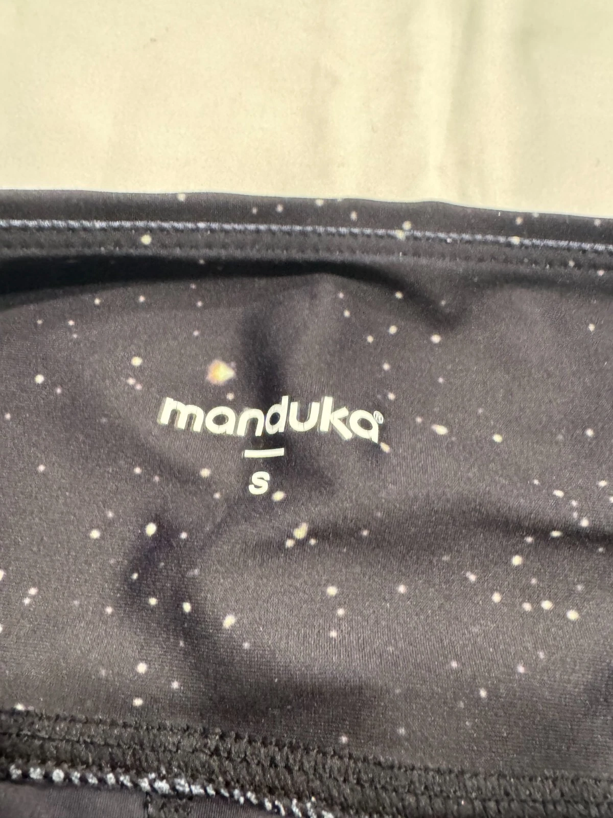 manduka shooting star print four-way stretch pull on pocket leggings