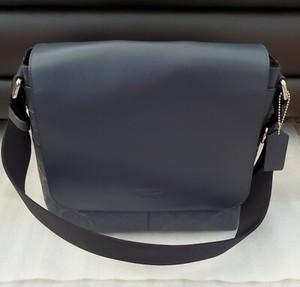 charles small messenger in signature leather