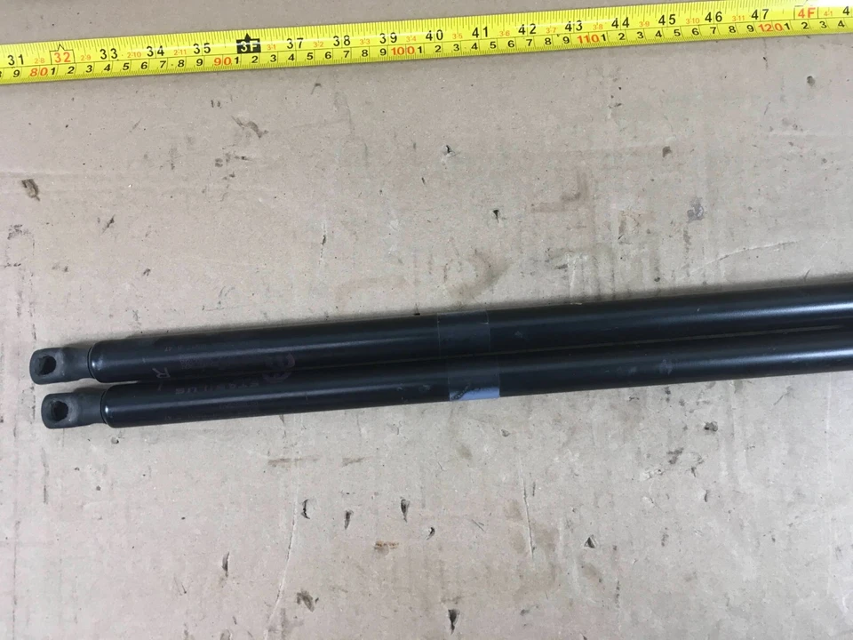 Dodge Grand Caravan 2017 escotilla trasera elevadora soporte amortiguador puntal OEM. Foto 2 de 4