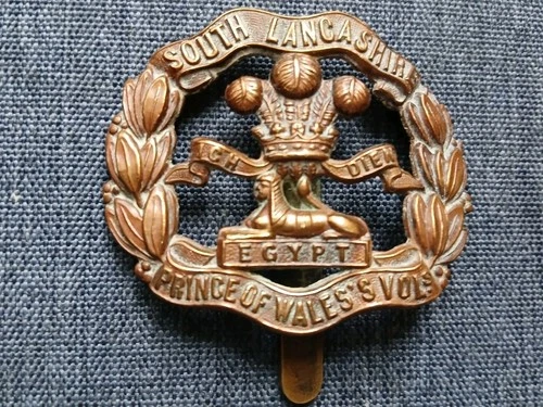 #097 – SOUTH LANCASHIRE REGIMENT WW1 BRASS ECONOMY CAP BADGE - LAMBOURNE