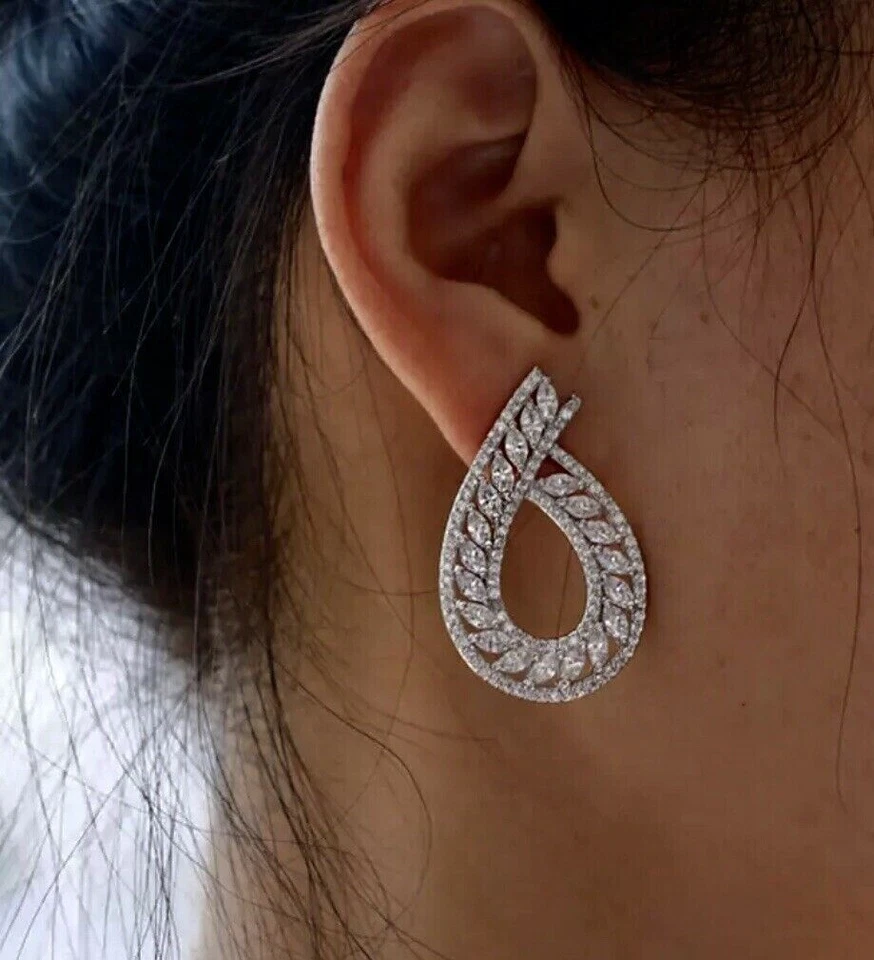 Pendientes rellenos de oro blanco de 18k hechos con joyería nupcial marquesa de cristal de Swarovski Foto 2 de 4