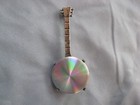 Vintage Reflective Rainbow Disc Banjo Pin — photo 1