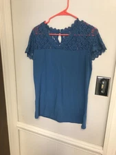 SIMPLY STYLED LARGE BLUE WOMANS TOP