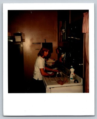 Young Woman Kitchen 1970s Snapshot Photograph Doing Dishes Candid