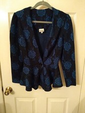 Cristina's Small Fitted Jacket With A Peplum Bottom