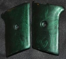 Phoenix Arms Raven MP 25 ACP pistol grips slide safety midnight green plastic