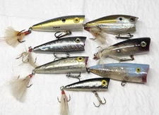 (7) Vintage New Topwater Poppers. Various Brands Rebel Cordell Rapala