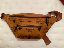  VERY NICE AUTHENTIC  NEW MCM FURSTEN MAXI MONOGRAMMED VI BELT BAG  L K