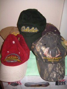 red and green baseball caps