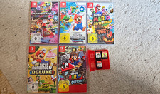 Nintendo Switch Konsole mit Dock, Joy-Con Rot/Blau, Pro Controller & Spiele