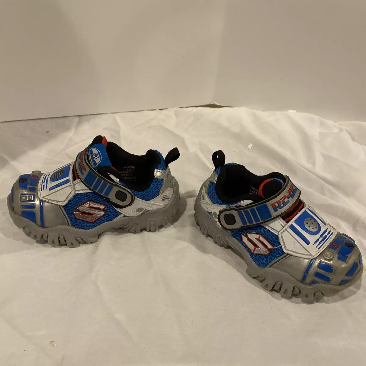 Sketcher toddler light clearance up shoes