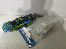 Used Traxxas RUSTLER 4X4 XL-5 Body Clip Less And New Raptor Body Proline