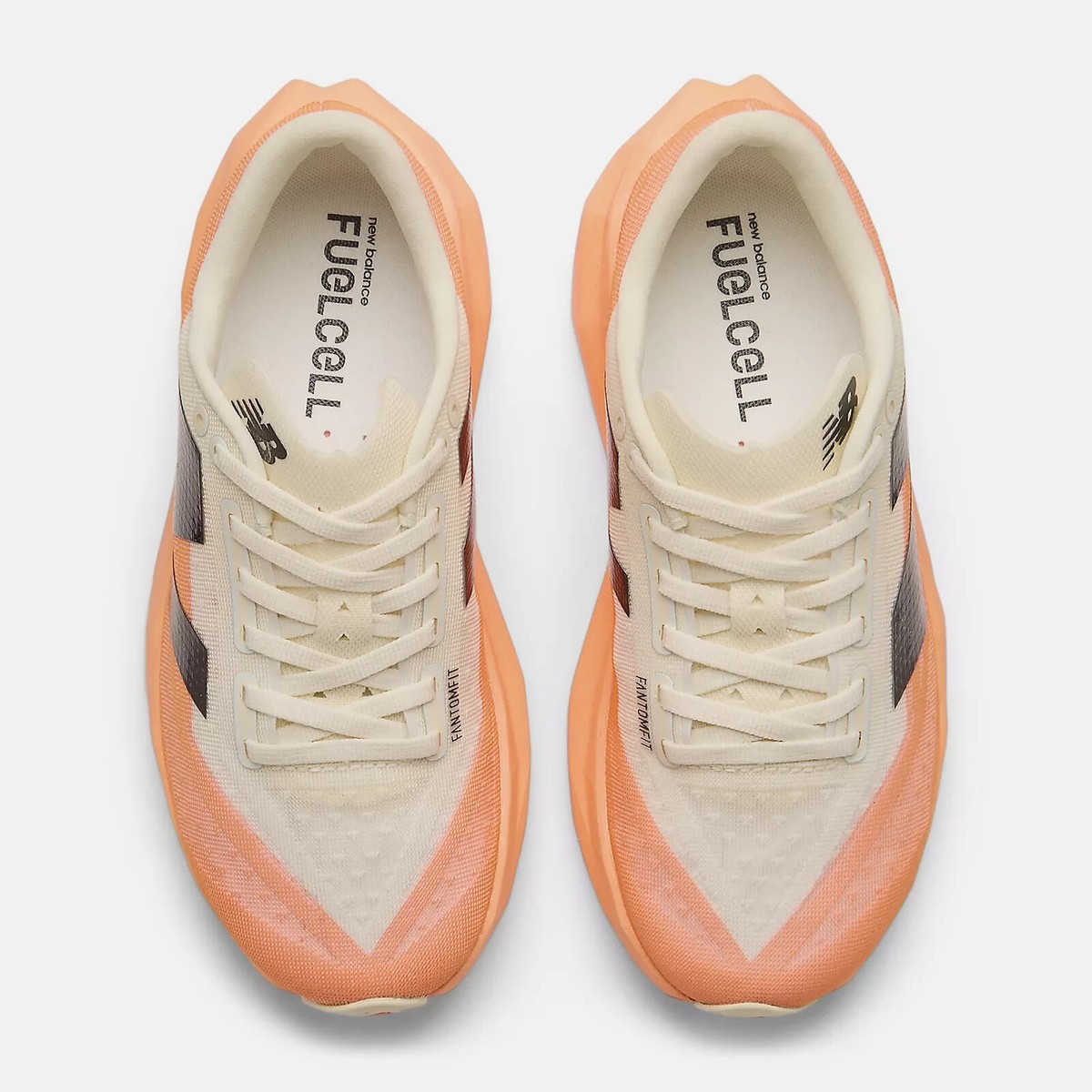 New Balance WMNS FuelCell Rebel v4 width B Orange WFCXCC4 Women's