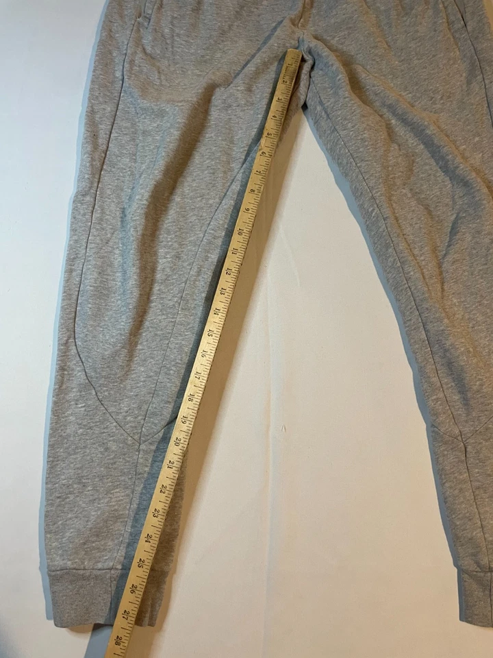 Pantalones deportivos Adidas para hombre gris medio polar cónicos entrenamiento para correr Foto 2 de 4