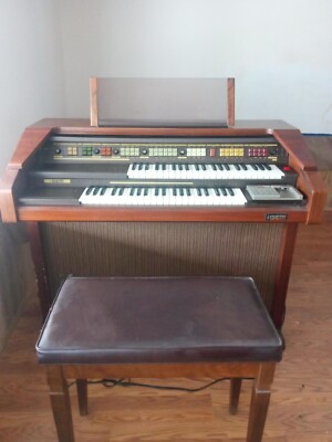 GEM G70 Electric Organ wooden exterior with a opening leather