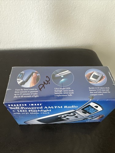 Sharper Image Self Powered AM/FM Radio + Led Flashlight With alarm Clock - Picture 5 of 7