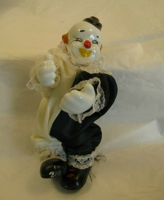 black and white clown doll
