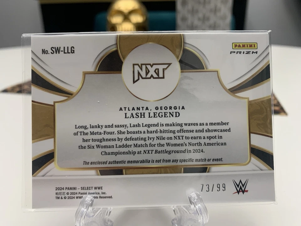 2024 WWE Panini Select Lash Legend Swatches Memorabilia Red Prizm #SW-LLG 73/99 - Image 2 of 3