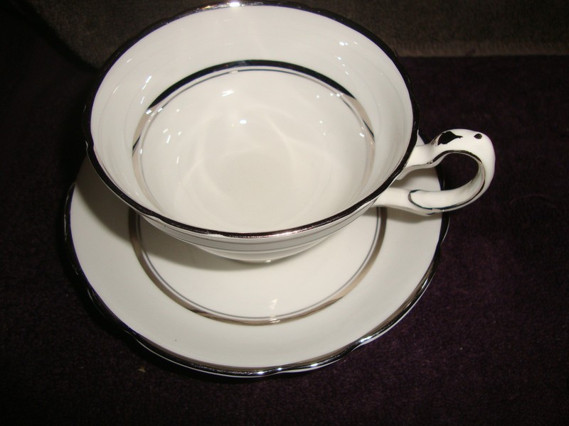 Grosvenor fine bone china England white with silver painted trim tea cup/saucer
