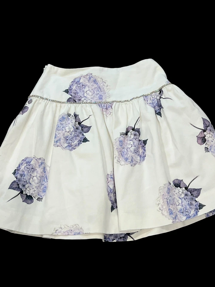 FALDA ACAMPANADA MONNALISA NIÑA BLANCA MORADA FLORES FLORES ESTRÁS TALLA 12-14 Foto 3 de 4