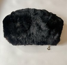 vintage fur muff with zipper pocket circa 1950s