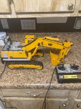 Vintage New Bright 1988  Caterpillar (Cat) Excavator 245D  Works-movement limits