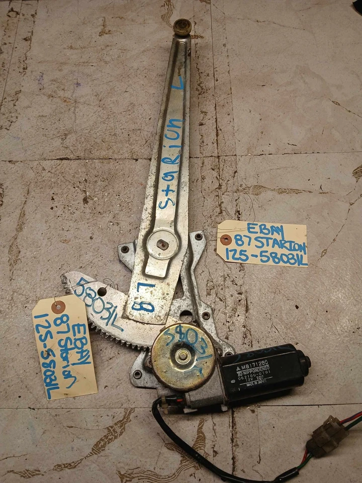 83-89 STARION 84-89 CONQUEST Puerta delantera izquierda Ventana eléctrica Motor Regulador OEM Foto 2 de 4