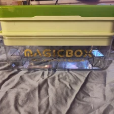 MAGICBOX, double-layer ice cube tray with a storage bin and lid, branded 