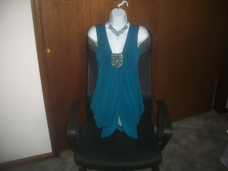 womens fly away hemline blouse.embellished.size medium