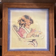 In Maud Tousy Fangel Framed Print Baby Girl In Highchair With Spoon Bowl 1920s