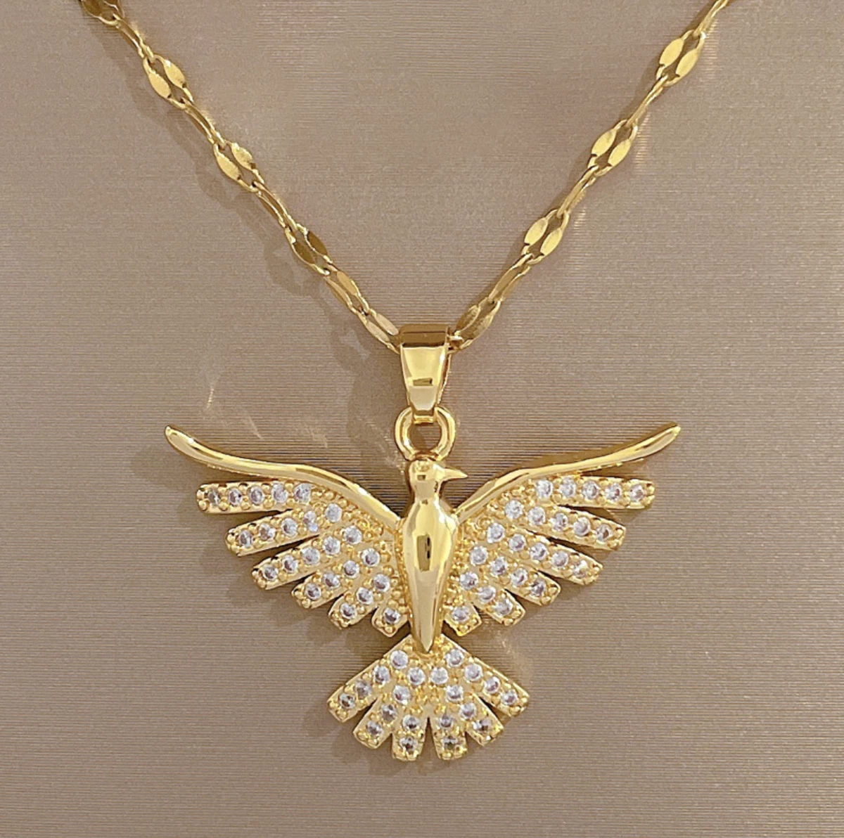 Gold phoenix pendant deals
