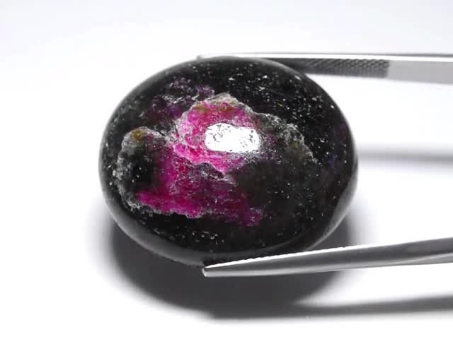 💎 50.69ct Oval Black Purplish Red Ruby in Zoisite - Unheated