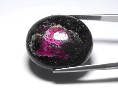 💎 50.69ct Oval Black Purplish Red Ruby in Zoisite - Unheated