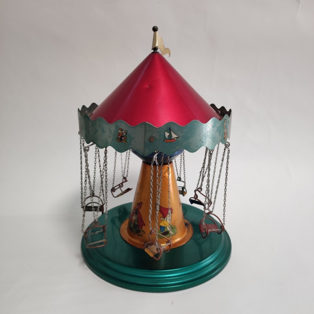 Giocattolo in latta giostra bambini seggiolini volanti 22x34 cm