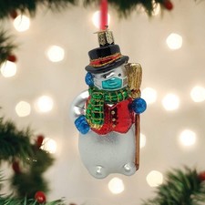 Old World Christmas Snowman with Face Mask Glass Blown Ornament  With OWC Box 