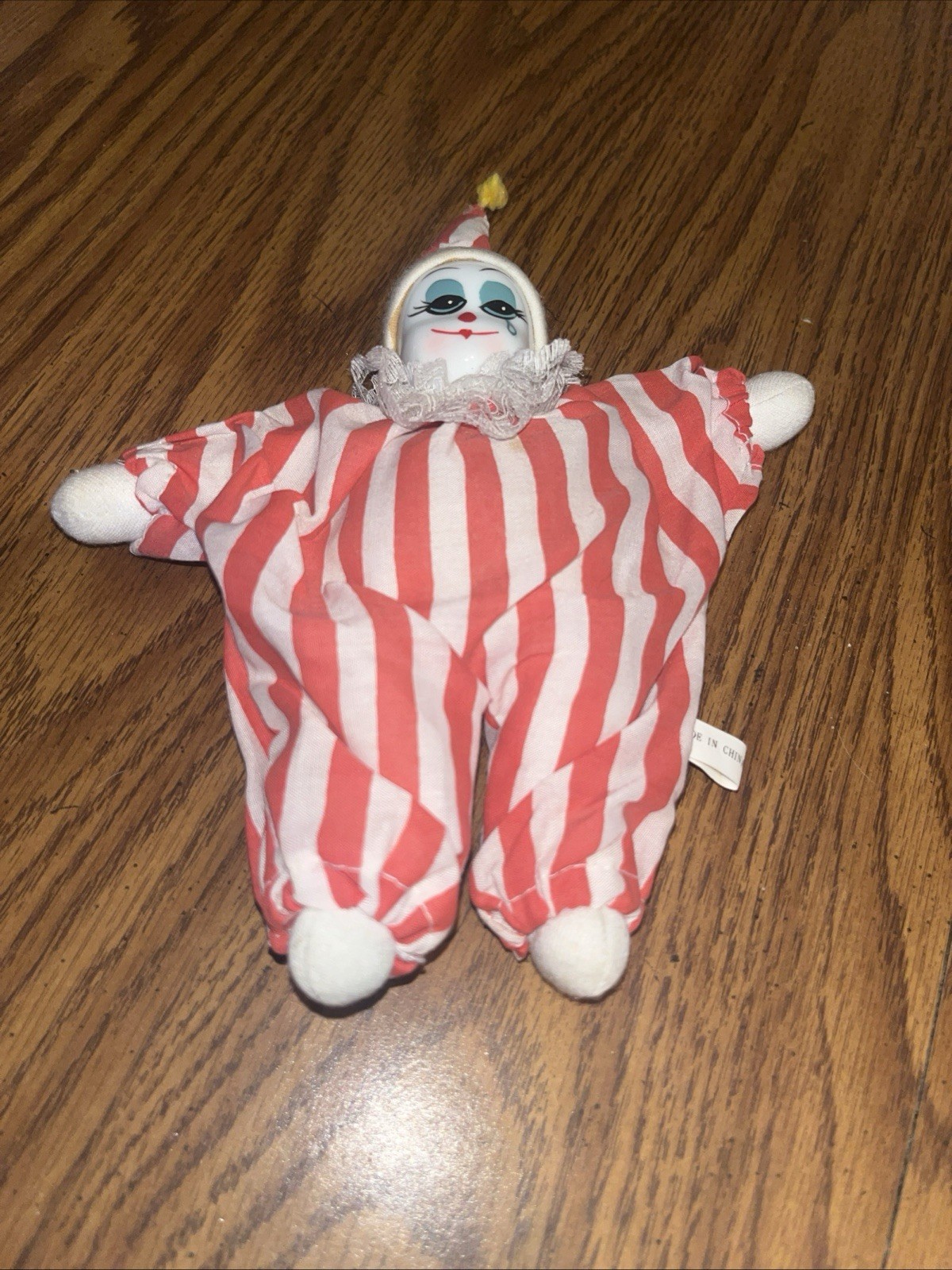 Vintage Hand-Painted Porcelain Clown Beanie Doll with Red Stripes-image