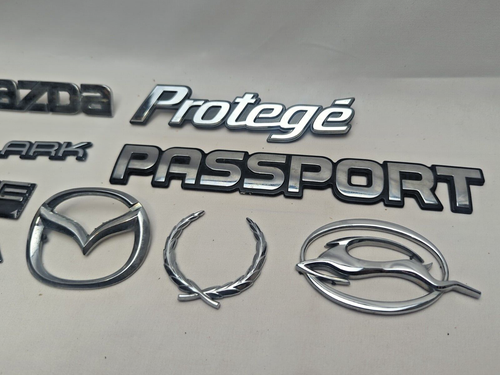 Lote emblema puerta GENUINO Mazda Skylark Protege Lumina Le Sabre - Imagen 3 de 4