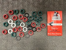 * VINTAGE CARROM GAME PIECES AND INSTRUCTION BOOK LOT *BR