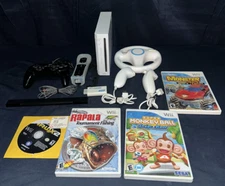 Nintendo Wii WHITE CONSOLE RVL-001 CONTROLLERS NUNCHUCKS 4 GAMES TESTED WORKING