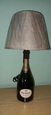 lampada da tavolo fatta con bottiglia di Vino Champagne Dom Ruinart 