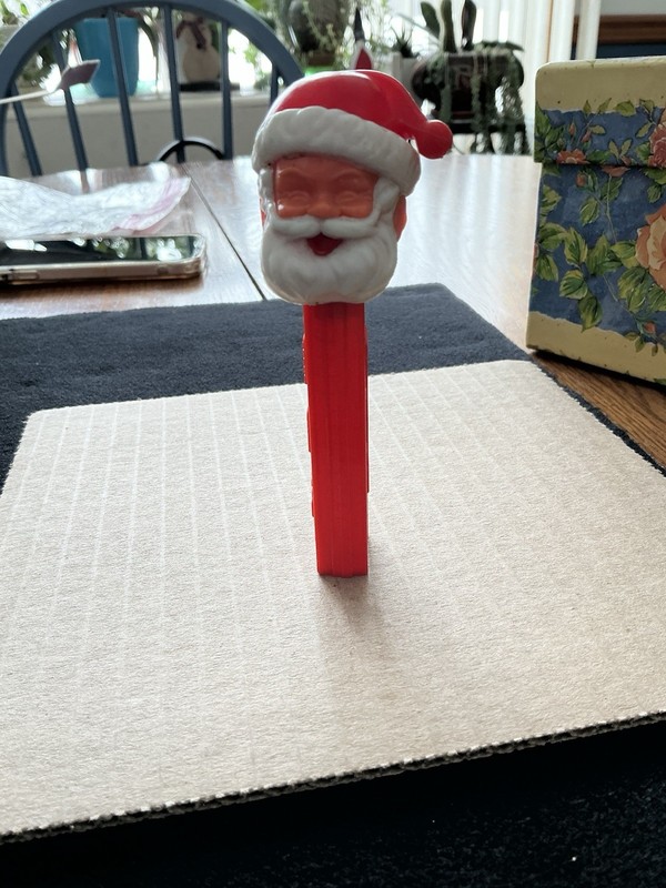 Vintage PEZ Santa Claus No Feet Yellow Stem Closed Eyes. Made In Austria