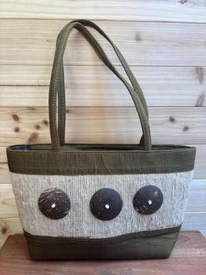 Olive green and beige textured handbag with coconut shell embellishments