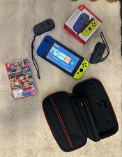 Nintendo Switch Konsole Joy-Cons Blau/Gelb mit 2 Spielen & Tasche