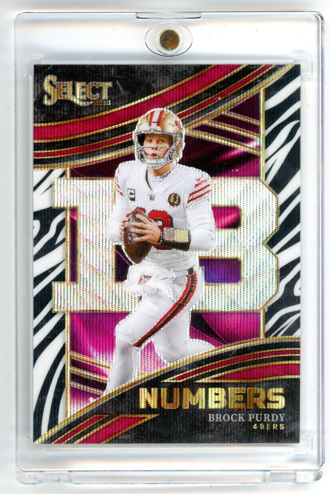2023 Panini Select #NMB-BPU Brock Purdy Numbers Zebra Prizm