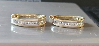 10KT YELLOW AND WHITE GOLD DIAMOND EARRINGS. 2.96g